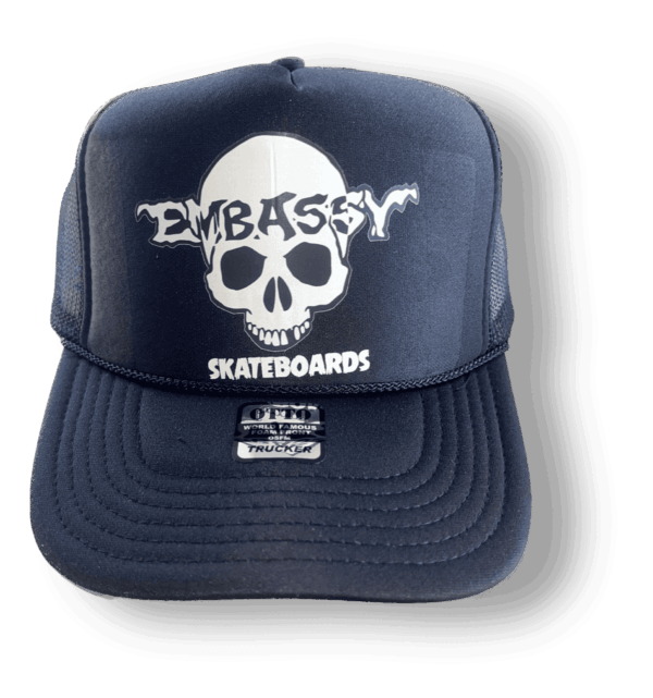 black trucker cap white skully print